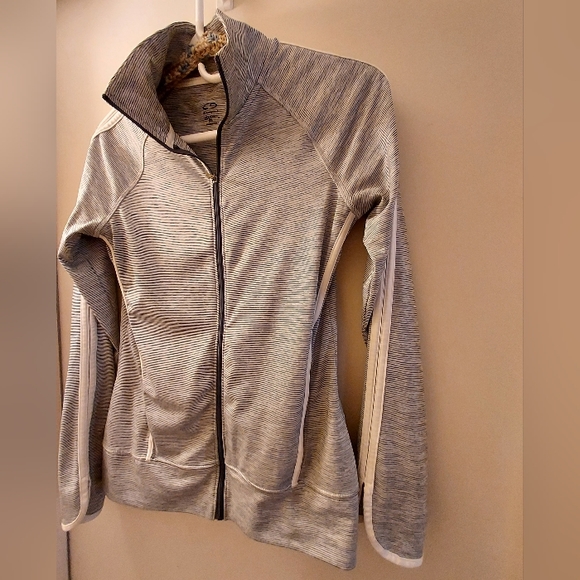 Women's x-small zip up lightweight athletic wear jacket. White with blue strips - Picture 4 of 6
